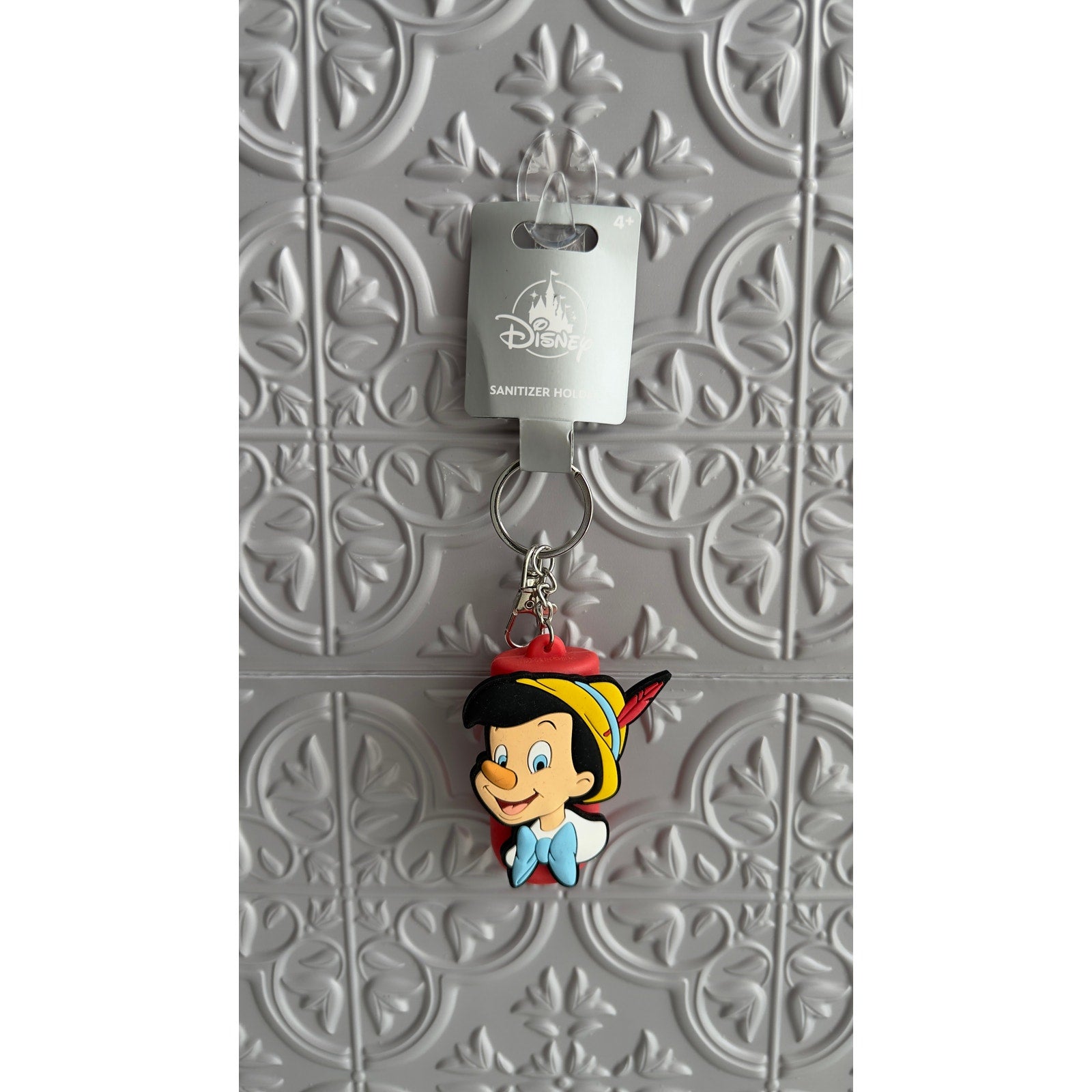 Disney Parks Pinocchio Hand Sanitizer Holder Clip Keychain NEW
