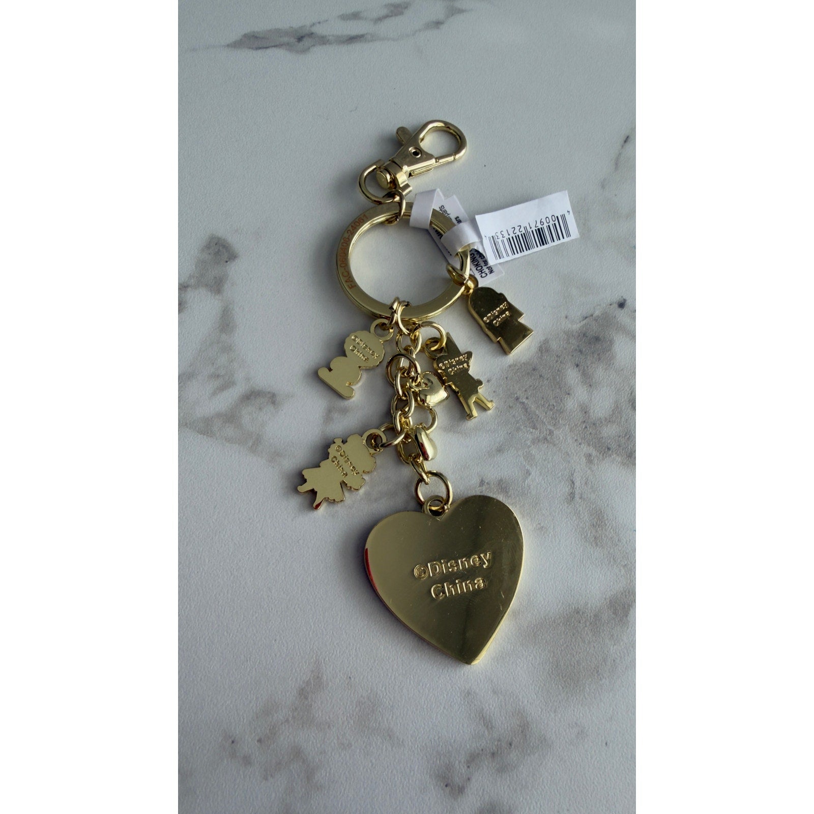 Disney Parks It's a Small World Hello Heart Keychain Bag Charm Gold Tone NEW