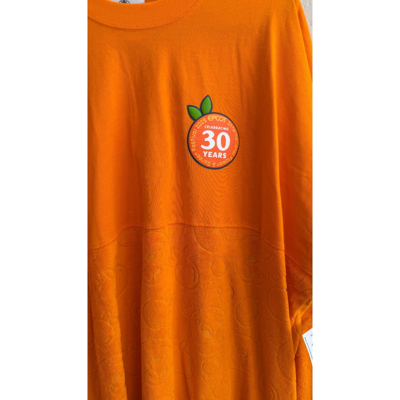 Disney Parks x Spirit Jersey 2025 EPCOT Flower & Garden Orange Bird Large