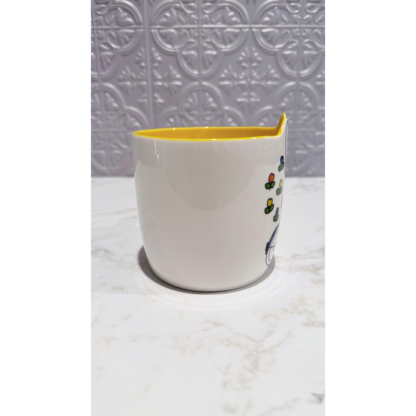Miffy By Magenta Bunny On Bike Flowers Ceramic Coffee Mug Yellow Interior NWT