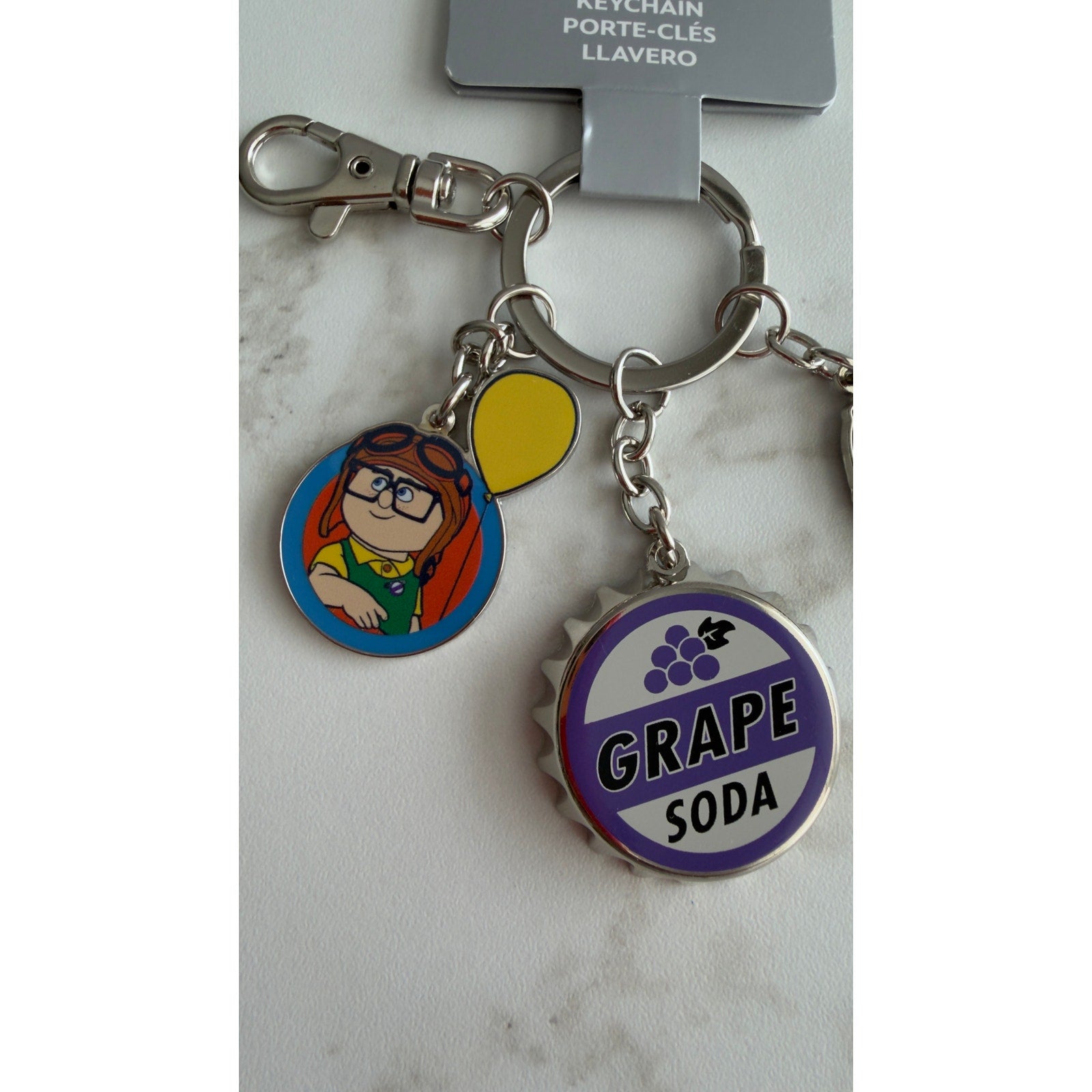 Disney Pixar Up Keychain Carl Ellie Grape Soda Cap 3 Charms NEW