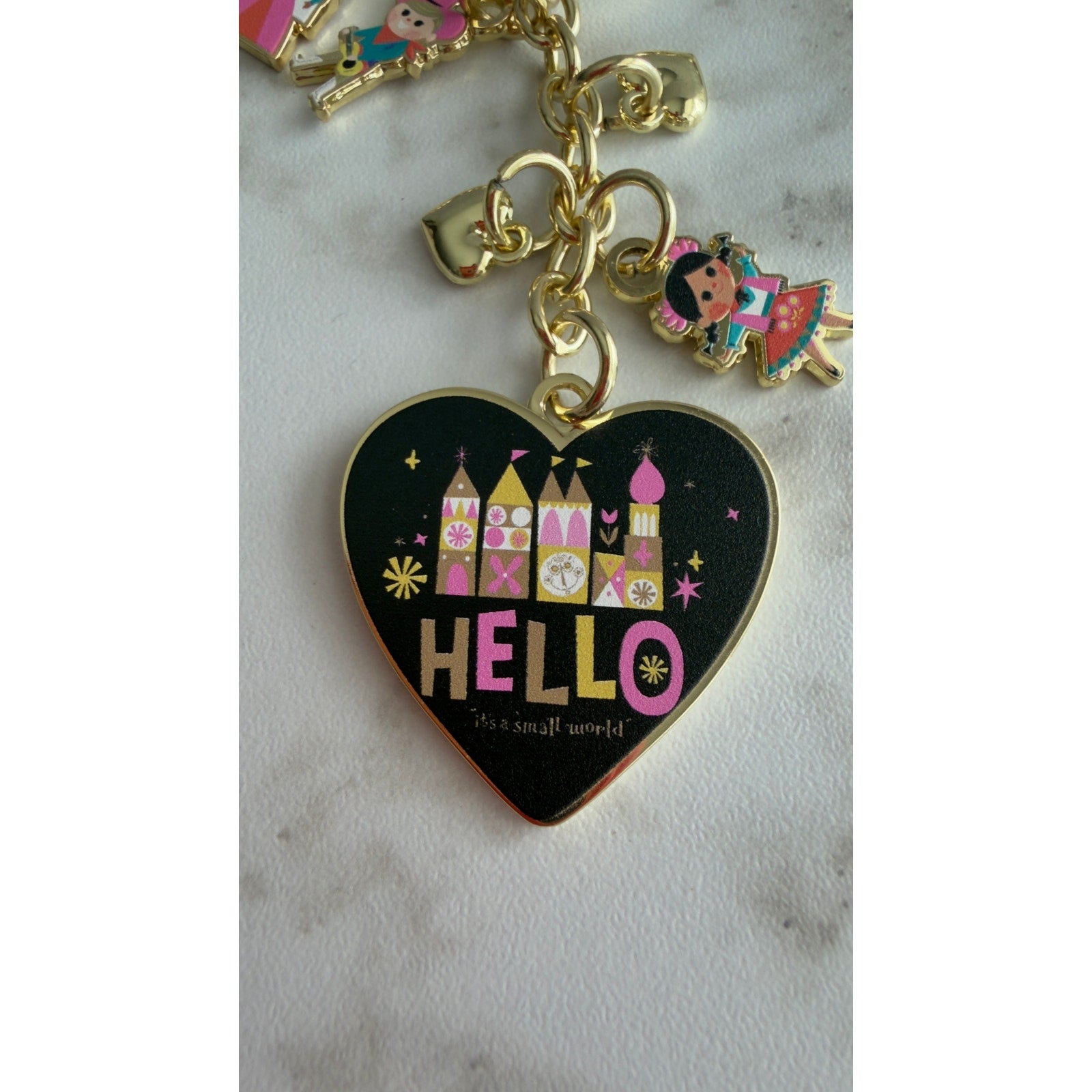 Disney Parks It's a Small World Hello Heart Keychain Bag Charm Gold Tone NEW