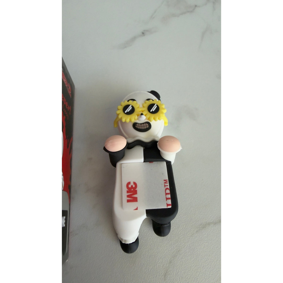 Terrifier 2 x Whatever! Art the Clown Mystery Phone Buddy Sunflower Sunglasses