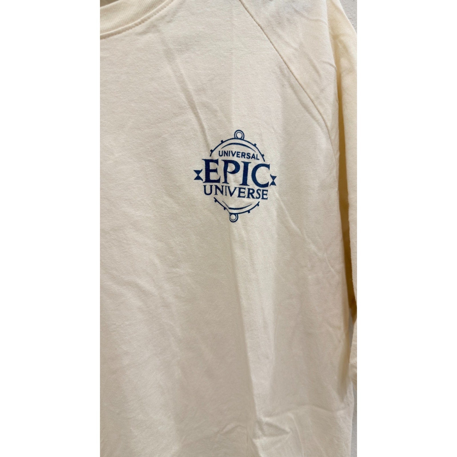 Universal Studios Epic Universe Emblem Logo T-Shirt - Ivory - Large - NWT