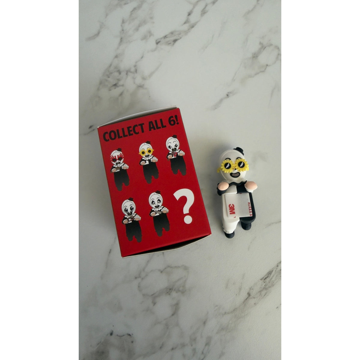 Terrifier 2 x Whatever! Art the Clown Mystery Phone Buddy Sunflower Sunglasses